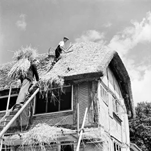 Mr Cecil Watson, and his son Stanley, the local thatchers Mr Cecil Watson, and his son Stanley, the local thatchers