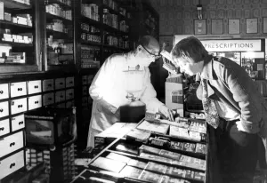 Mr. James Taylor maintaining essential services by emergency lighting in a pharmacy Mr. James Taylor maintaining essential services by emergency lighting in a pharmacy