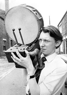 Mr. John Heslop with part of the percussion fitments that form part of a pre-war theatre Mr. John Heslop with part of the percussion fitments that form part of a pre-war theatre