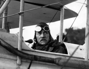 Mr Ramsay MacDonald in the aeroplane in which he flew to London on urgent State business Mr Ramsay MacDonald in the aeroplane in which he flew to London on urgent State business