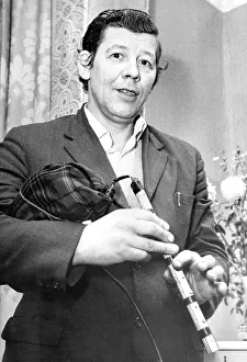 Mr. Tommy Richardson with his latest invention electronic bagpipes in November 1972 Mr. Tommy Richardson with his latest invention electronic bagpipes in November 1972
