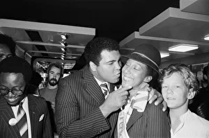 Muhammad Ali gives a British Airways hostess a kiss on his visit to Birmingham Muhammad Ali gives a British Airways hostess a kiss on his visit to Birmingham