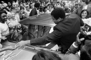 Muhammad Ali is mobbed by fans and supporters in the streets of Birmingham Muhammad Ali is mobbed by fans and supporters in the streets of Birmingham