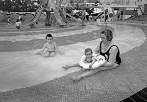 Mum and baby enjoy the shallow pool at The Suncentre, Rhyl Mum and baby enjoy the shallow pool at The Suncentre, Rhyl