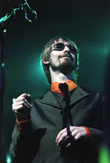Neil Hannon of the pop group Divine Comedy in concert circa 1999 Neil Hannon of the pop group Divine Comedy in concert circa 1999