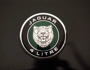 THE NEW JAGUAR XK8 NOVEMBER 1997 JAGUAR 4 LITRE BADGE THE NEW JAGUAR XK8 NOVEMBER 1997 JAGUAR 4 LITRE BADGE