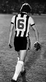 Newcastle United sweeper Irving Nattrass walks off the pitch carrying rocks Newcastle United sweeper Irving Nattrass walks off the pitch carrying rocks
