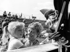 Nice to see you, says Mr Punch to little Jacqueline McGrath of Redcar at British Nice to see you, says Mr Punch to little Jacqueline McGrath of Redcar at British