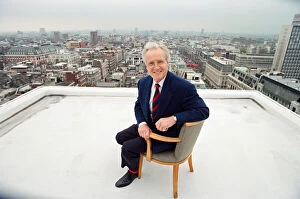 Images Dated 17th May 1994: Nicholas Parsons, TV Presenter and actor, pictured on a roof top. 17th May 1994