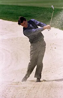 Nick Faldo Golf drives out of a fairway bunker during the Pro Am at The Oxfordshire Golf Nick Faldo Golf drives out of a fairway bunker during the Pro Am at The Oxfordshire Golf