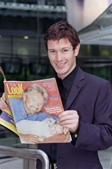 Images Dated 8th October 1998: Nick Moran Actor October 98 At the launch of Film Four Channel 4 holding a copie of