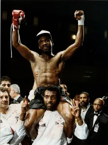Nigel Benn Boxer Being lifted on the shoulders of Ambrose Mendy after beating Robbie Nigel Benn Boxer Being lifted on the shoulders of Ambrose Mendy after beating Robbie