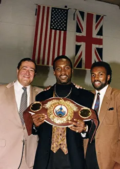 Nigel Benn Boxer with Manager Ambrose Mendy and American Promoter Bob Arun Nigel Benn Boxer with Manager Ambrose Mendy and American Promoter Bob Arun
