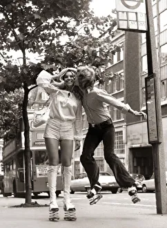 Nigel Lythgoe pictured in 1971 kissing a girl - Heather Berkers - with springs on his Nigel Lythgoe pictured in 1971 kissing a girl - Heather Berkers - with springs on his