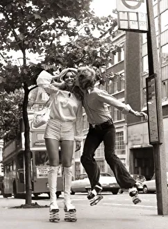 Nigel Lythgoe pictured in 1971 kissing Heather Berkers with springs on his shoes Nigel Lythgoe pictured in 1971 kissing Heather Berkers with springs on his shoes