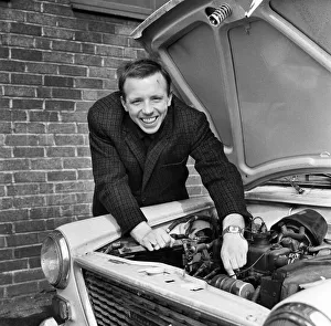 Nobby Stiles Manchester United player seen here tinkering with the engine of his car 8th Nobby Stiles Manchester United player seen here tinkering with the engine of his car 8th