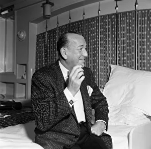 Noel Coward arrives at Southampton onboard the Queen Elizabeth. 4th June 1957 Noel Coward arrives at Southampton onboard the Queen Elizabeth. 4th June 1957