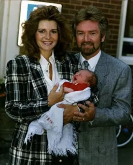 Images Dated 4th May 1990: Noel Edmonds Tv Presenter with new born baby Olivia and wife Helen