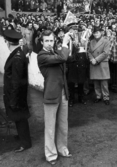 Nottingham Forest captain John McGovern shows off the League cup trophy to the crowd at Nottingham Forest captain John McGovern shows off the League cup trophy to the crowd at