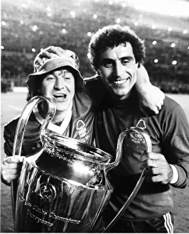 Nottingham Forest players John Robertson and Peter Shilton celebrate with the trophy Nottingham Forest players John Robertson and Peter Shilton celebrate with the trophy