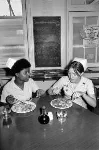 Nurses Nicola Reive (21) and Dawn Hamer (22) eating lunch in the Canteen at The Prince of Nurses Nicola Reive (21) and Dawn Hamer (22) eating lunch in the Canteen at The Prince of