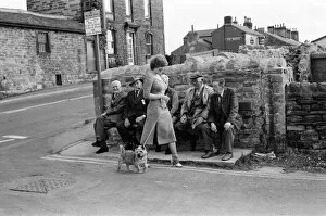 Images Dated 9th August 1979: Old boys watch the girls go by from the bench at the junction of Keighly Road, Silsden