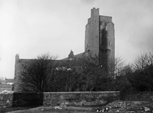 The old churchyard wall surrounding the cemetery, with the Parish Church The old churchyard wall surrounding the cemetery, with the Parish Church