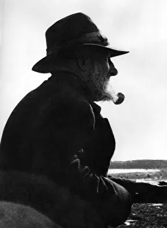 An old Portleven fisherman enjoys his pipe and his memories of the record catches of An old Portleven fisherman enjoys his pipe and his memories of the record catches of