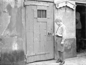 The Old Watch House at Ewell October 1933 Unlocking the door of the old Watch House The Old Watch House at Ewell October 1933 Unlocking the door of the old Watch House