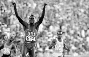 Olympic Games 1984 Los Angeles USA American athlete Carl Lewis raises his arms Olympic Games 1984 Los Angeles USA American athlete Carl Lewis raises his arms
