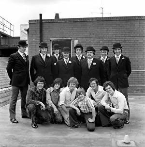 Images Dated 16th August 1974: The Osmond Brothers pop group pose with body guards dressed as city gents with bowler
