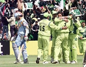 Images Dated 8th June 1999: Pakistans Wasim Akram mobbed by team mates June 1999 After Taking The Wicket
