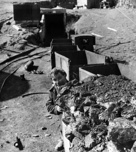 Parc Level Mine, Rhiwfawr, Swansea Valley. A tram of coal is brought out by Kenyon Guinn Parc Level Mine, Rhiwfawr, Swansea Valley. A tram of coal is brought out by Kenyon Guinn