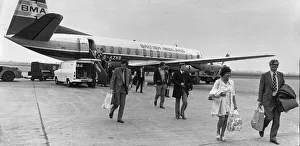 Passengers disembarking from a British Midlands Airlines Vickers Viscount aircraft at Passengers disembarking from a British Midlands Airlines Vickers Viscount aircraft at