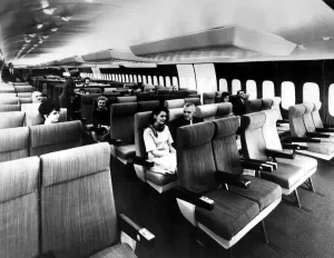 Passengers sit inside the massive interior of the Boeing 747. 12/01/1970 Passengers sit inside the massive interior of the Boeing 747. 12/01/1970