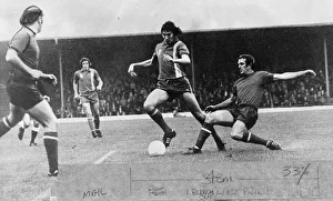 past a challenge during the game v Colchester United - 15th November 1975 past a challenge during the game v Colchester United - 15th November 1975