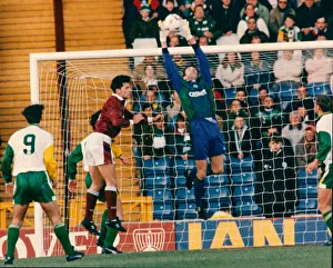 Pat Bonner reaches up high to catch the ball in front of goal Pat Bonner reaches up high to catch the ball in front of goal