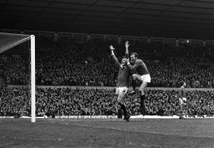 Pat Crerand celebrates with Brian Kidd after third goal 1970 for Manchester United Pat Crerand celebrates with Brian Kidd after third goal 1970 for Manchester United