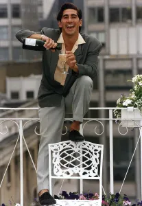 Paul Carofotes star of Televisions Knotts Landing cracks open the champagne at Paul Carofotes star of Televisions Knotts Landing cracks open the champagne at