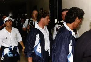 Paul Gascoigne surrounded by phpotographers and reporters after he walked silently out of Paul Gascoigne surrounded by phpotographers and reporters after he walked silently out of