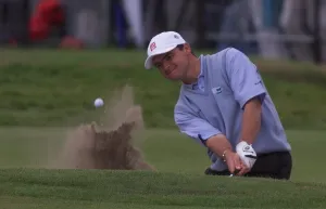 Paul Lawrie plays out of a bunker on the 18th green July 1999 Paul Lawrie plays out of a bunker on the 18th green July 1999