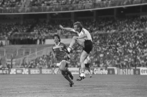 Paul Mariner and Hans Pieter Breigal during world cup 1982 England v Germany Paul Mariner and Hans Pieter Breigal during world cup 1982 England v Germany