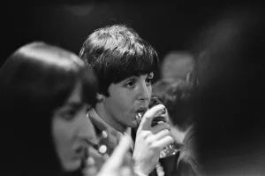 Paul McCartney enjoying a drink of wine as he attends the Ready Steady Go Rediffusion Paul McCartney enjoying a drink of wine as he attends the Ready Steady Go Rediffusion