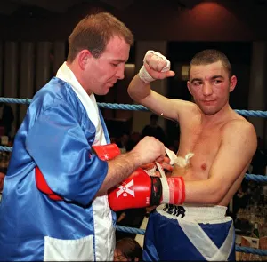 Paul Weir taking gloves off after losing fight 1998 against Alfonso Zvenyika Paul Weir taking gloves off after losing fight 1998 against Alfonso Zvenyika