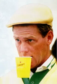 Images Dated 20th July 1990: Payne Stewart Golfer July 1990 at St Andrews Scotland - with Schweppes Cup in Mouth
