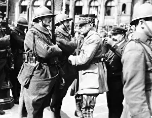 Peace Celebrations in Paris - Marshall Fock decorates a French soldier Peace Celebrations in Paris - Marshall Fock decorates a French soldier