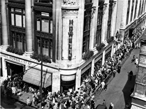 People queue outside Howells department store, St Mary Street, Cardiff. 7th August 1958 People queue outside Howells department store, St Mary Street, Cardiff. 7th August 1958