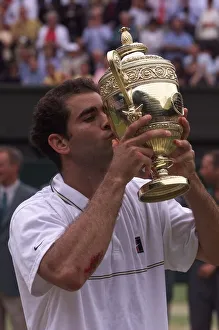 Pete Sampras kisses trophy after victory at Wimbledon 1999 after beating Andre Agassi in Pete Sampras kisses trophy after victory at Wimbledon 1999 after beating Andre Agassi in