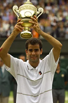 Pete Sampras lifts trophy after winning Wimbledon title 1999 against Andre Agassi in Pete Sampras lifts trophy after winning Wimbledon title 1999 against Andre Agassi in