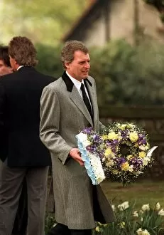Images Dated 2nd April 1990: Peter Dean Actor carrying a wreath at the funeal of Mark Reid the son of Comedian Actor